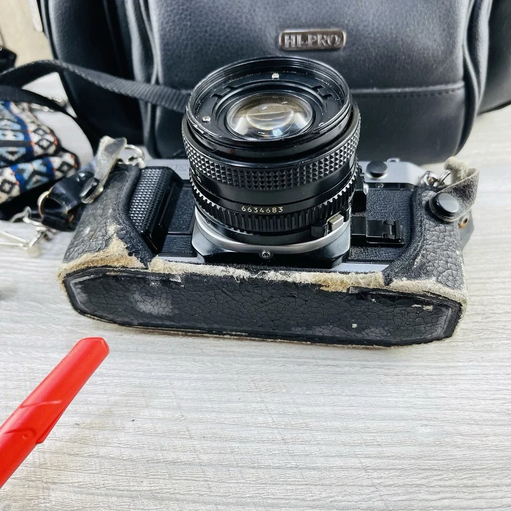 Canon AE-1 35mm SLR Film Camera w/ 50mm f/1.4 FD Lens